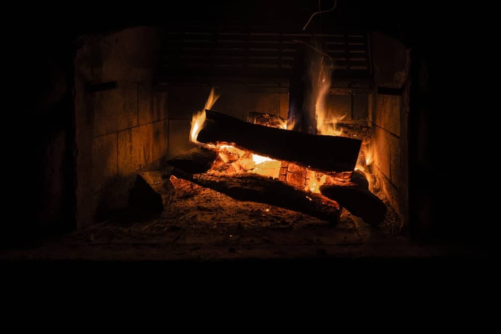 campfire with glowing flames