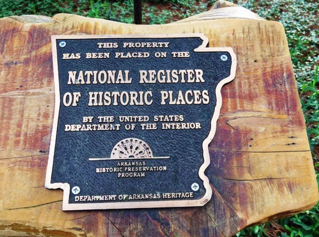 Plaque indicating a property is listed on the National Register of Historic Places.